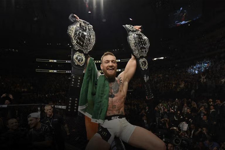 Conor McGregor Mocks Nate Diaz After Bloody TKO Loss to Mike Perry